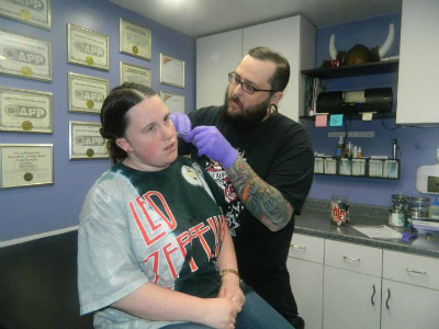 Me getting pierced at Infinite.