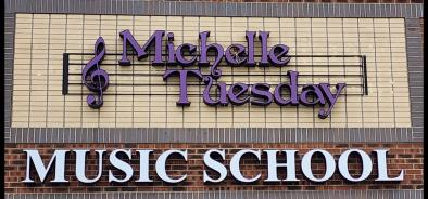 Exterior signage at the music school's Polaris location.